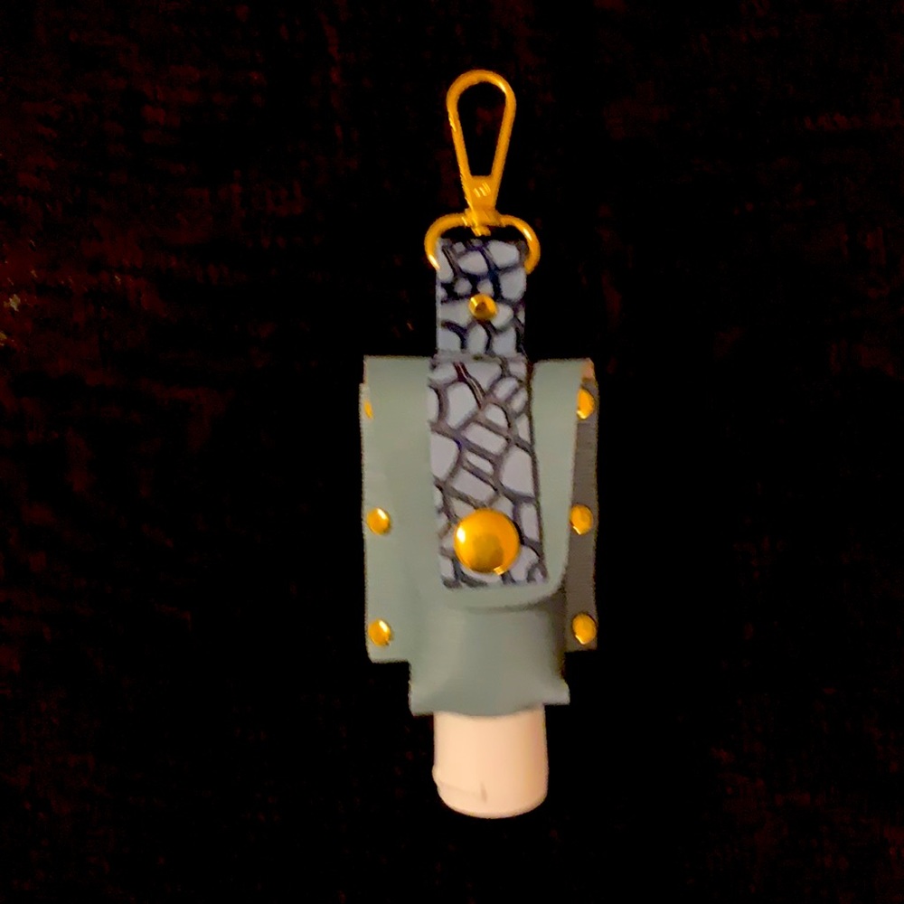 New Sanitizer holder- Handmade real leather in sky blue with animal print.